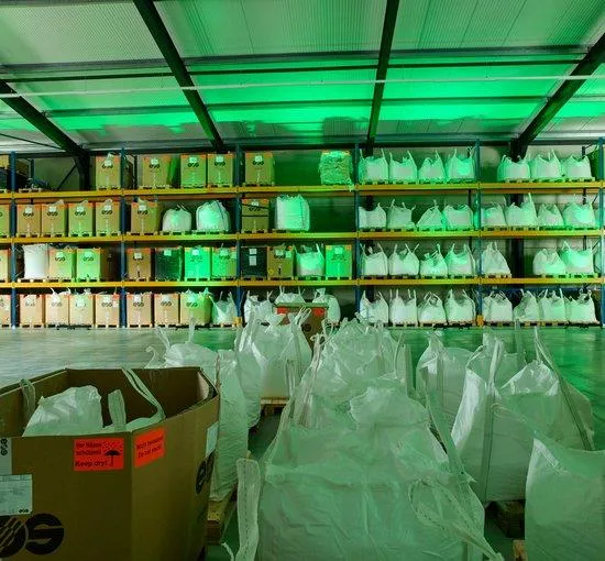 Racks of powder in big bags and boxes